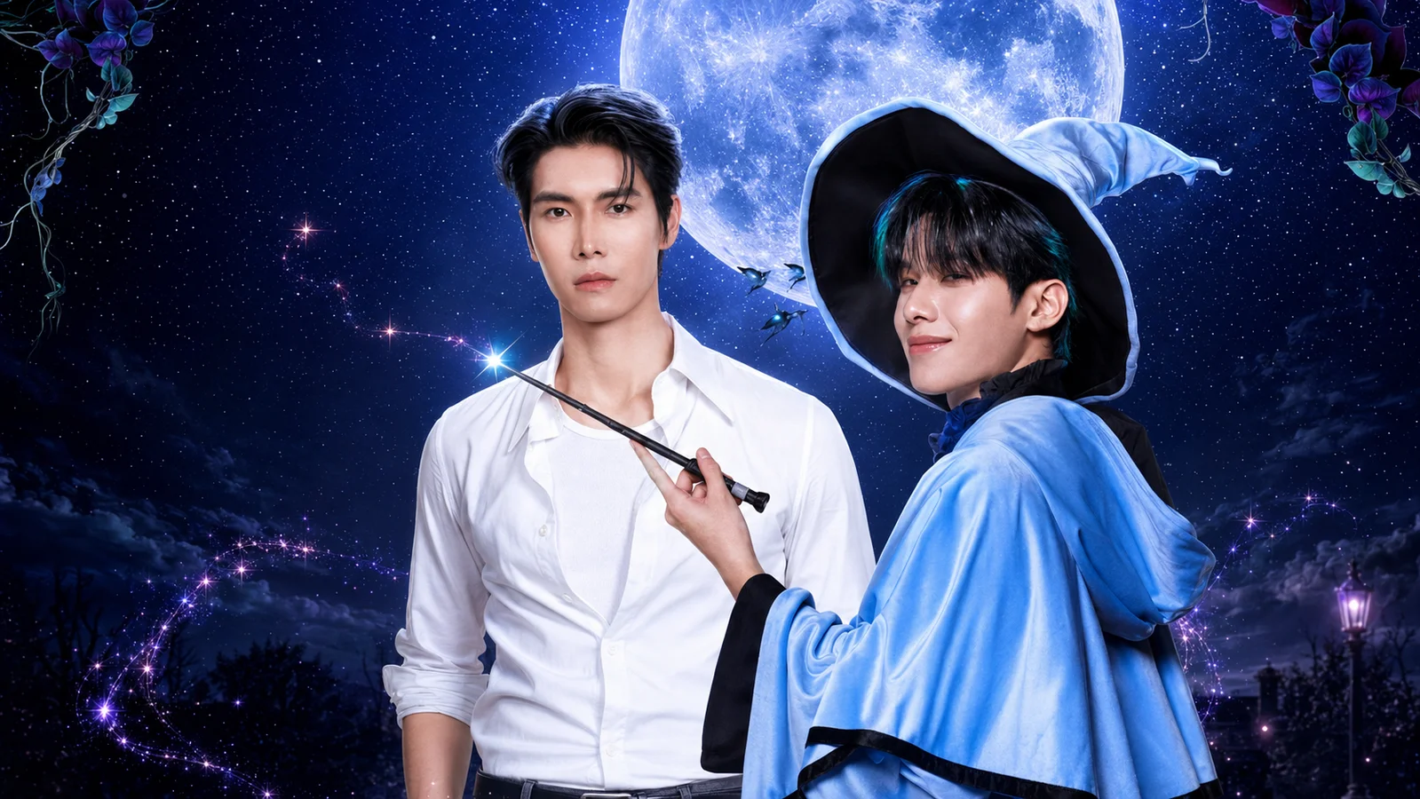 JJay Patiphan, wearing a white shirt, poses beside Ohm Thanakrit in a blue wizard cape and pointed hat beneath a glowing moon and starry magical sky.
