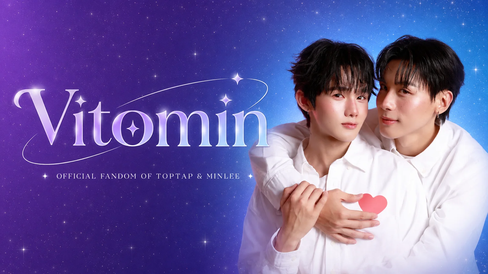 Promotional hero graphic for Toptap and Minlee’s fandom reveal, featuring the pair in white shirts embracing against a purple-to-blue starry background, with the large glowing word “Vitomin” on the left and the subtitle “Official Fandom of Toptap & Minlee.”
